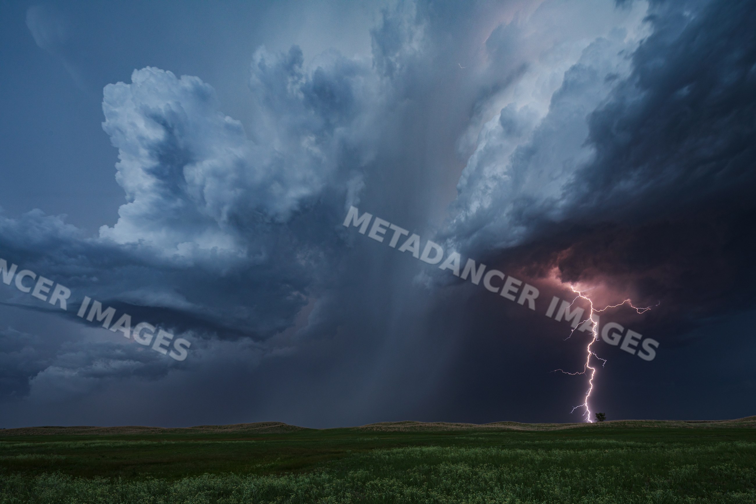 Lightning Strike over Nebraska Sandhills at Blue Hour near dunning