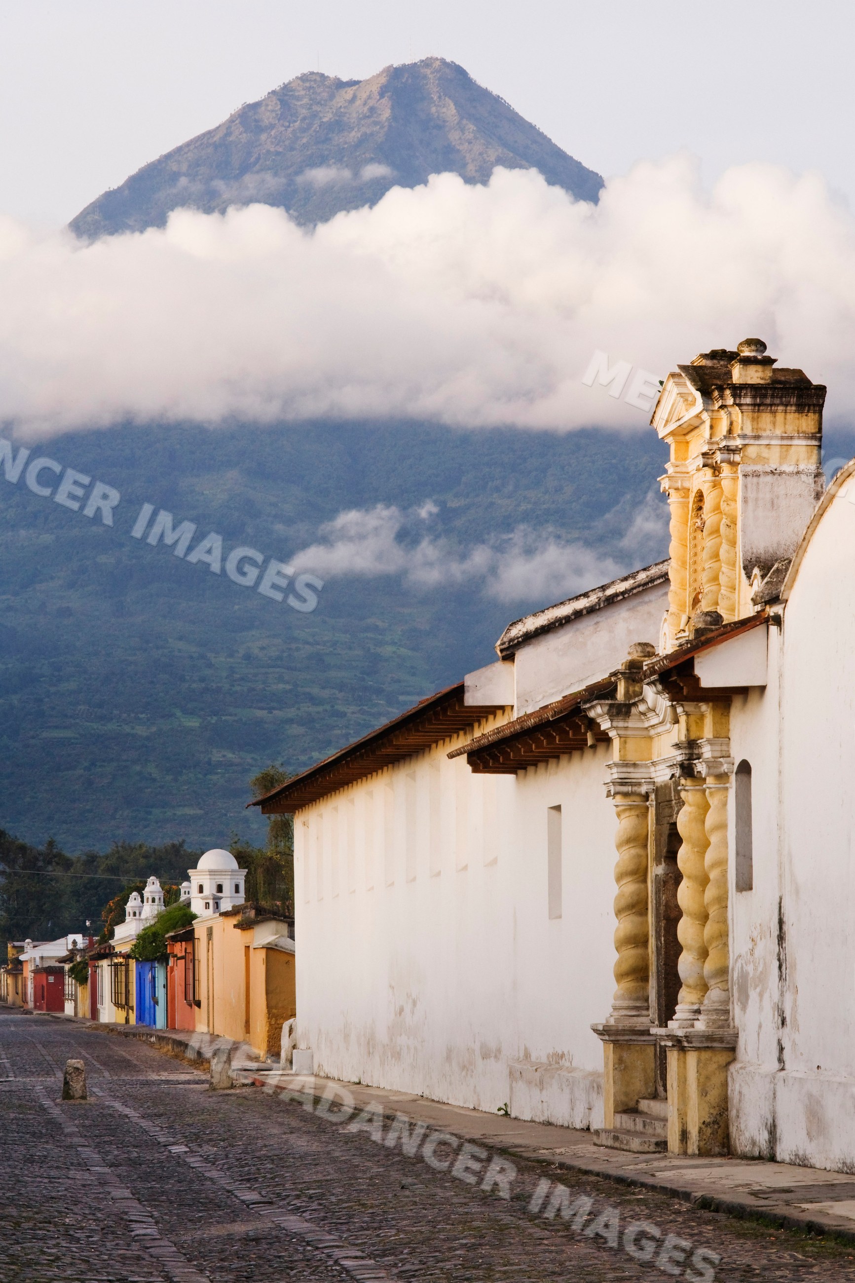 Agua volcano behind colonial street guatemala
