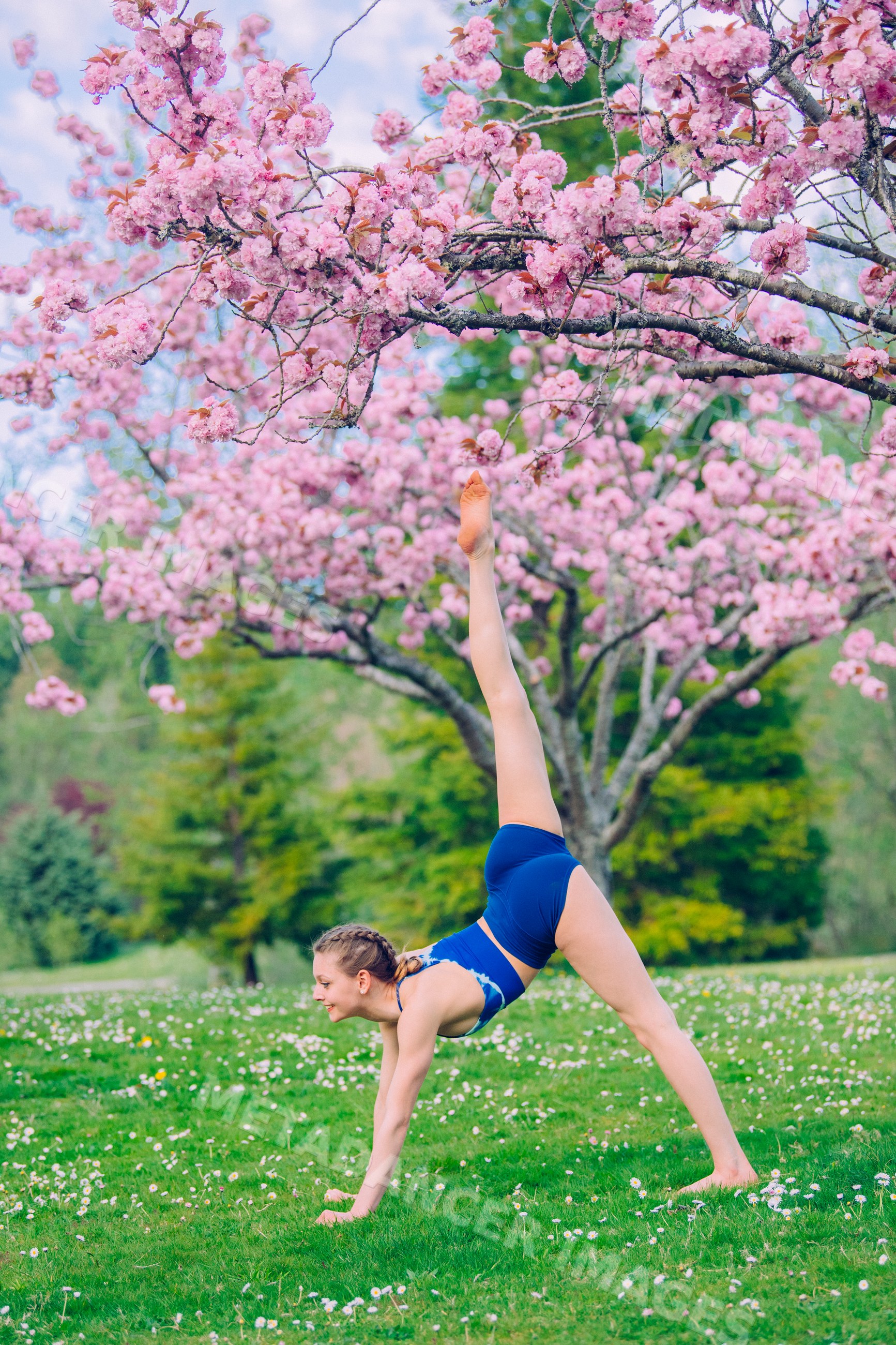 White woman practicing yoga outdoors
