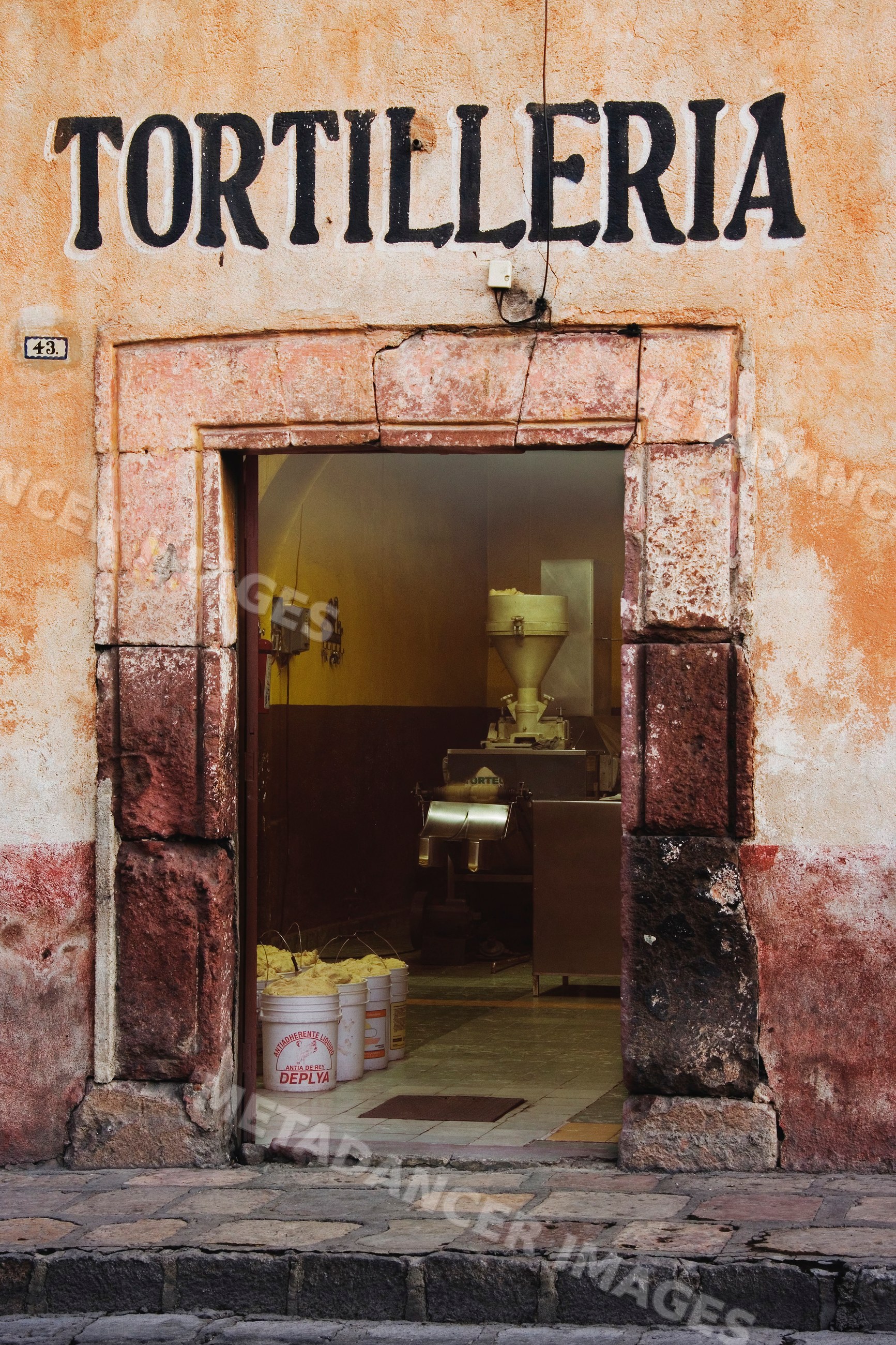Tortilleria bakery with corn dough and milling machine mexico