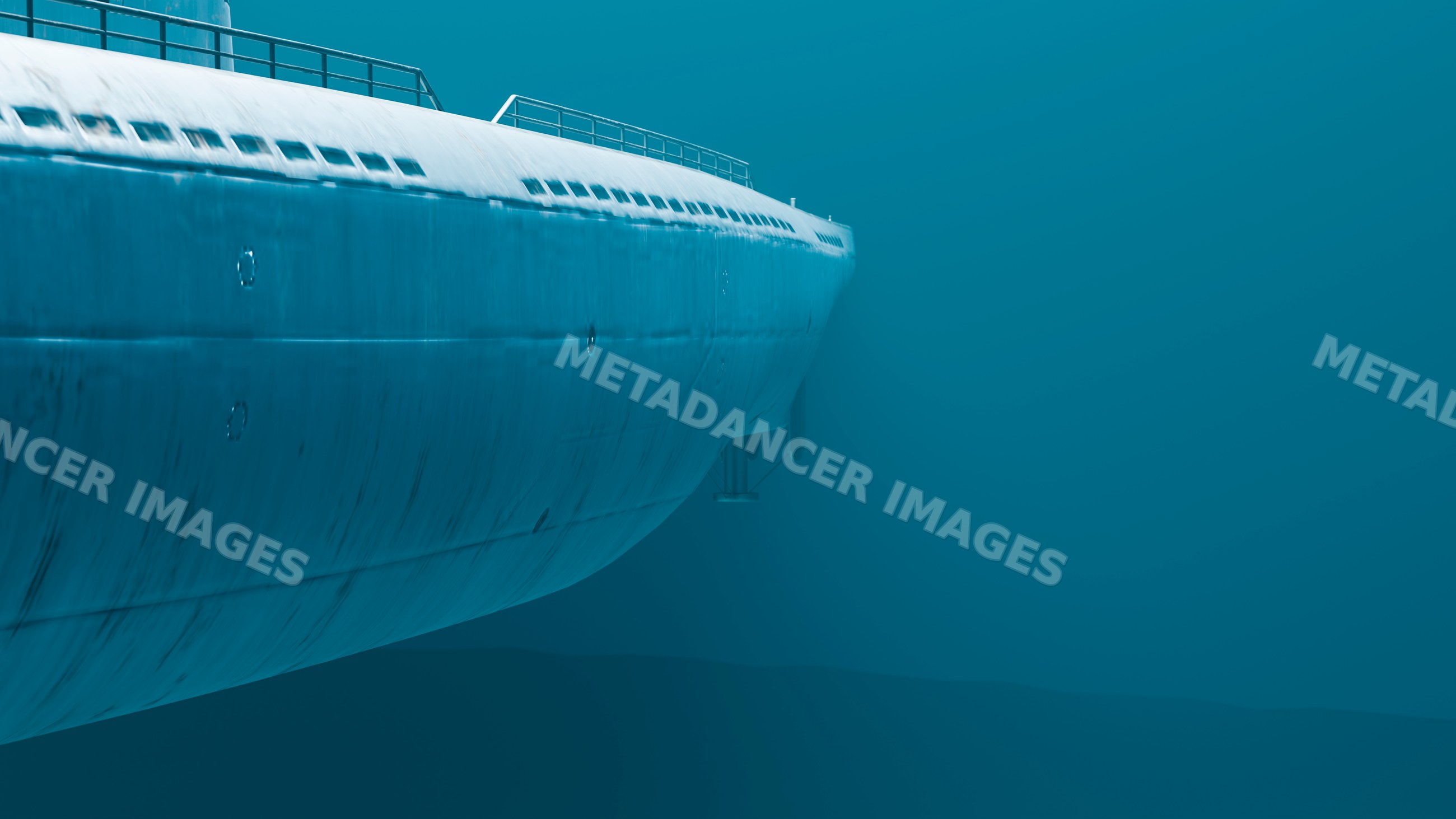 Submarine submerged underwater showing metal hull and portholes