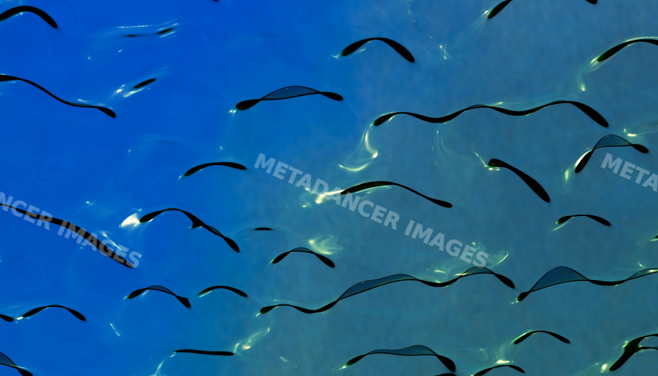 Water surface with ripples and light reflections creating abstract
