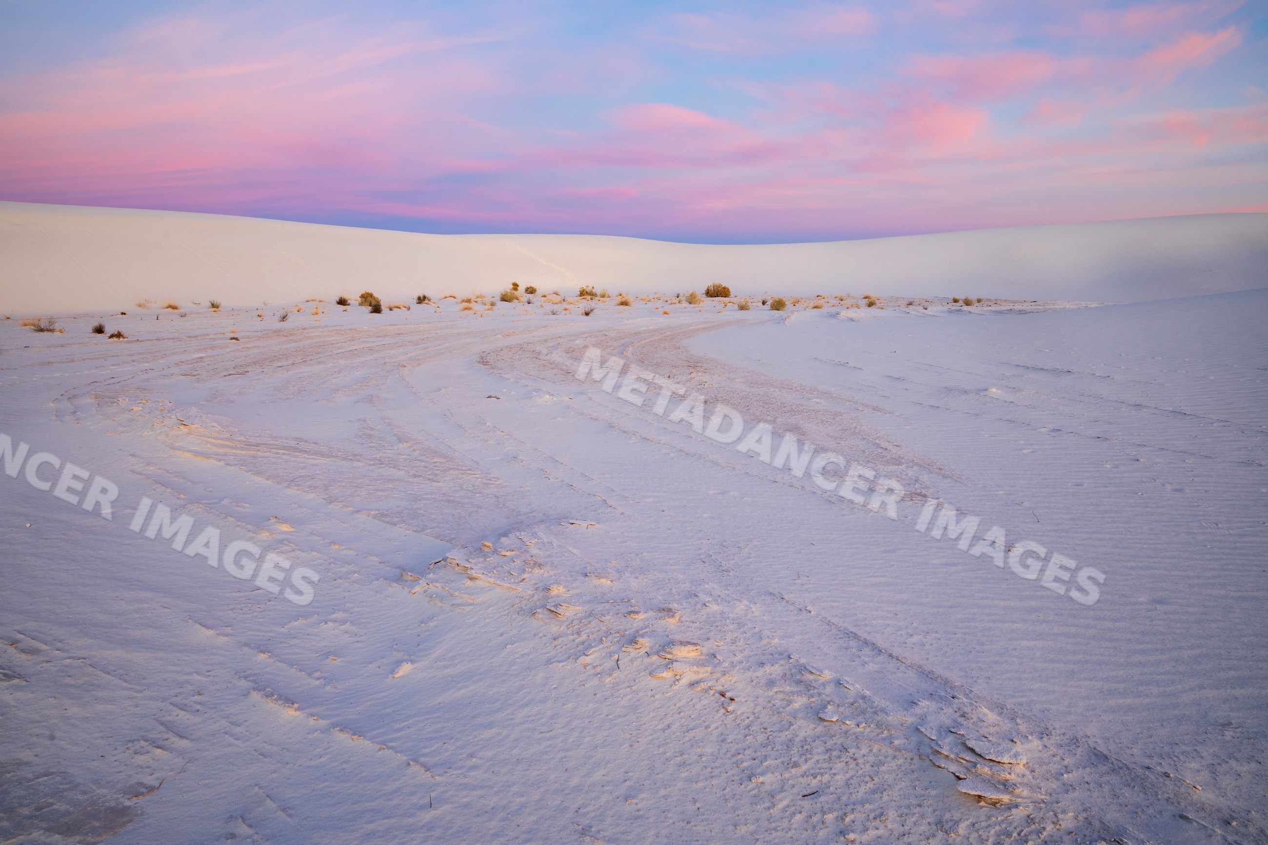 Sunrise over sand dunes at white sands national park in a park