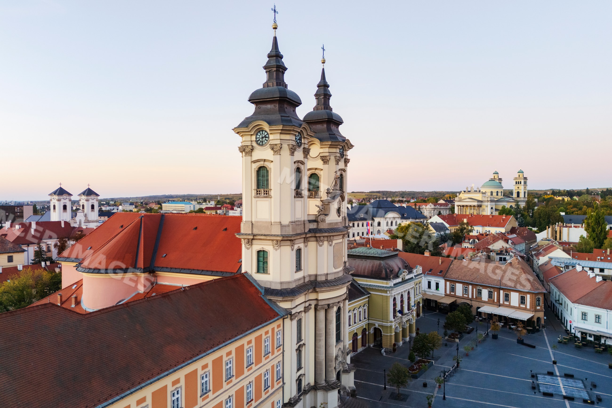 Minorite Church and Dobó Square at dawn in eger Hungary cityscape