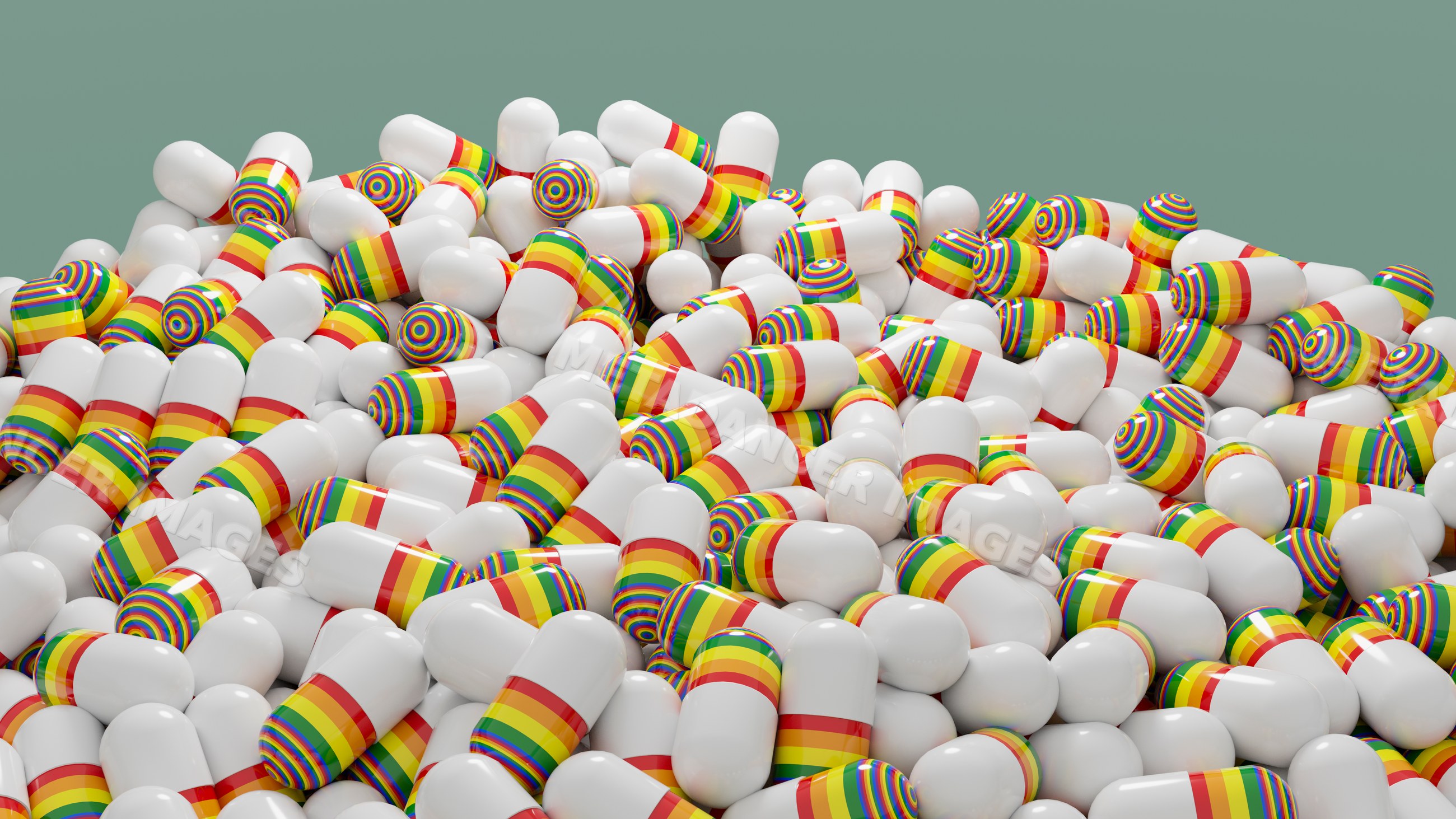 Pile of white medicine capsules with rainbow-colored bands
