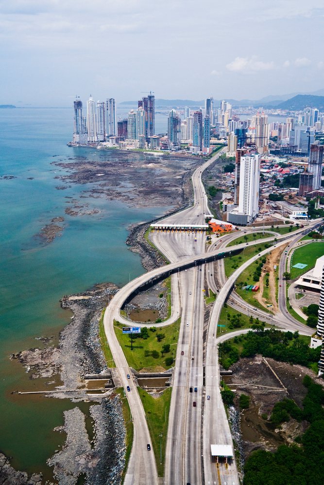 Aerial view of corredor sur highway and panama city skyline
