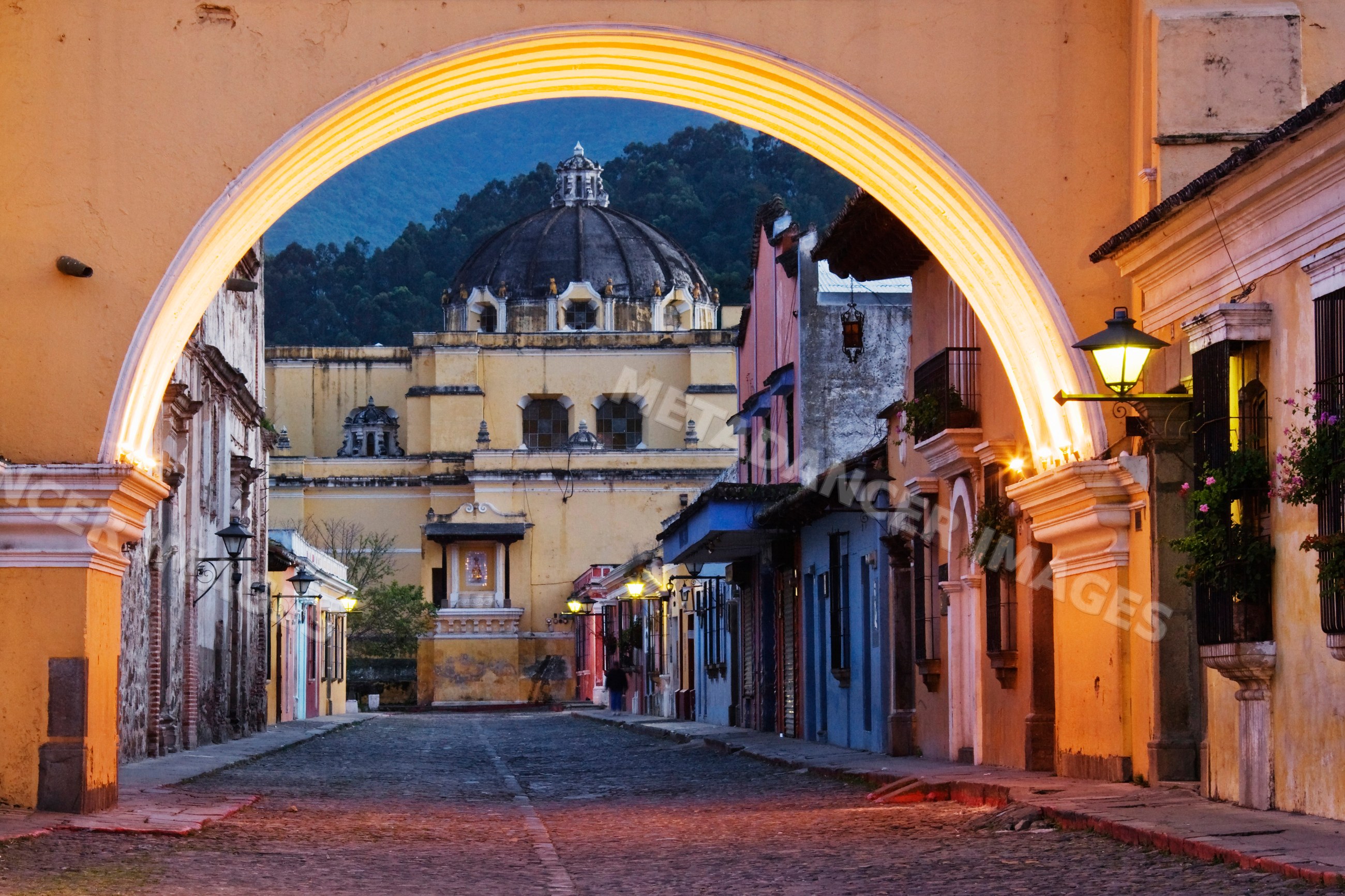 Santa catarina arch framing street and dome guatemala