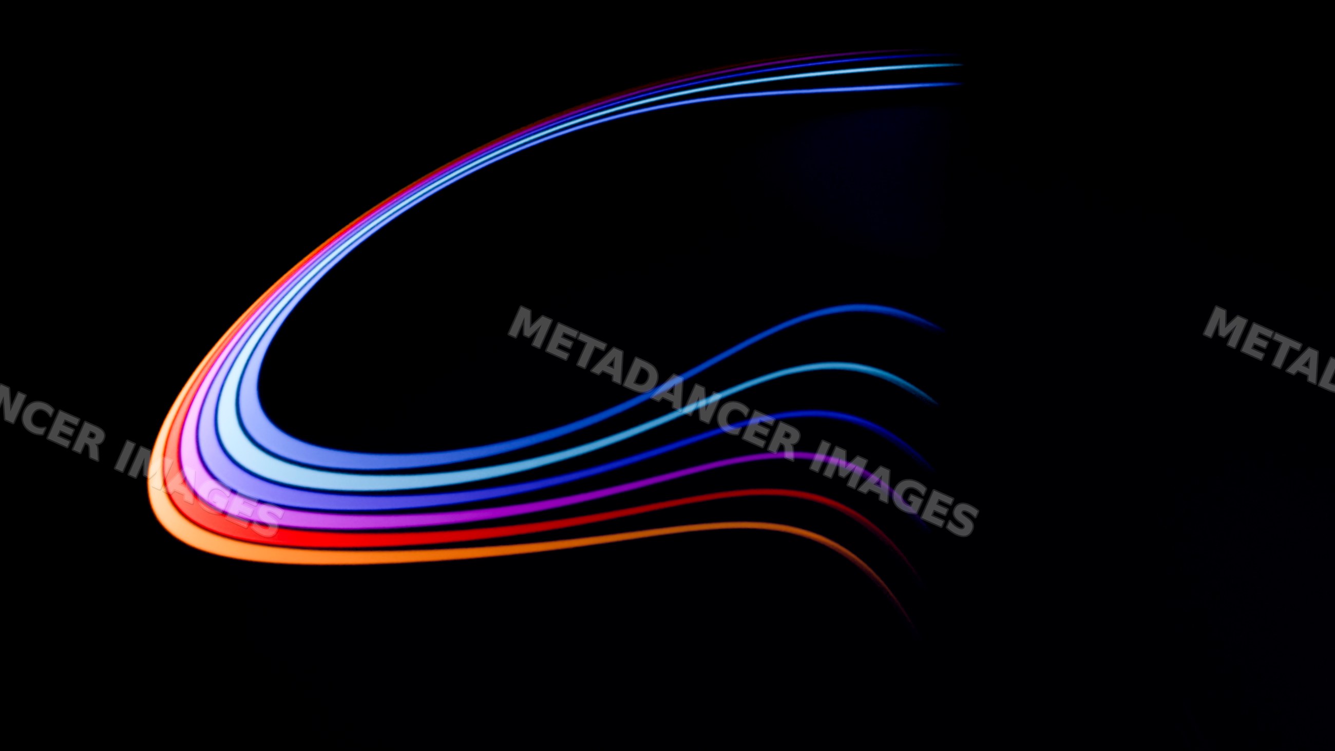 Abstract colorful curved light streaks on dark background