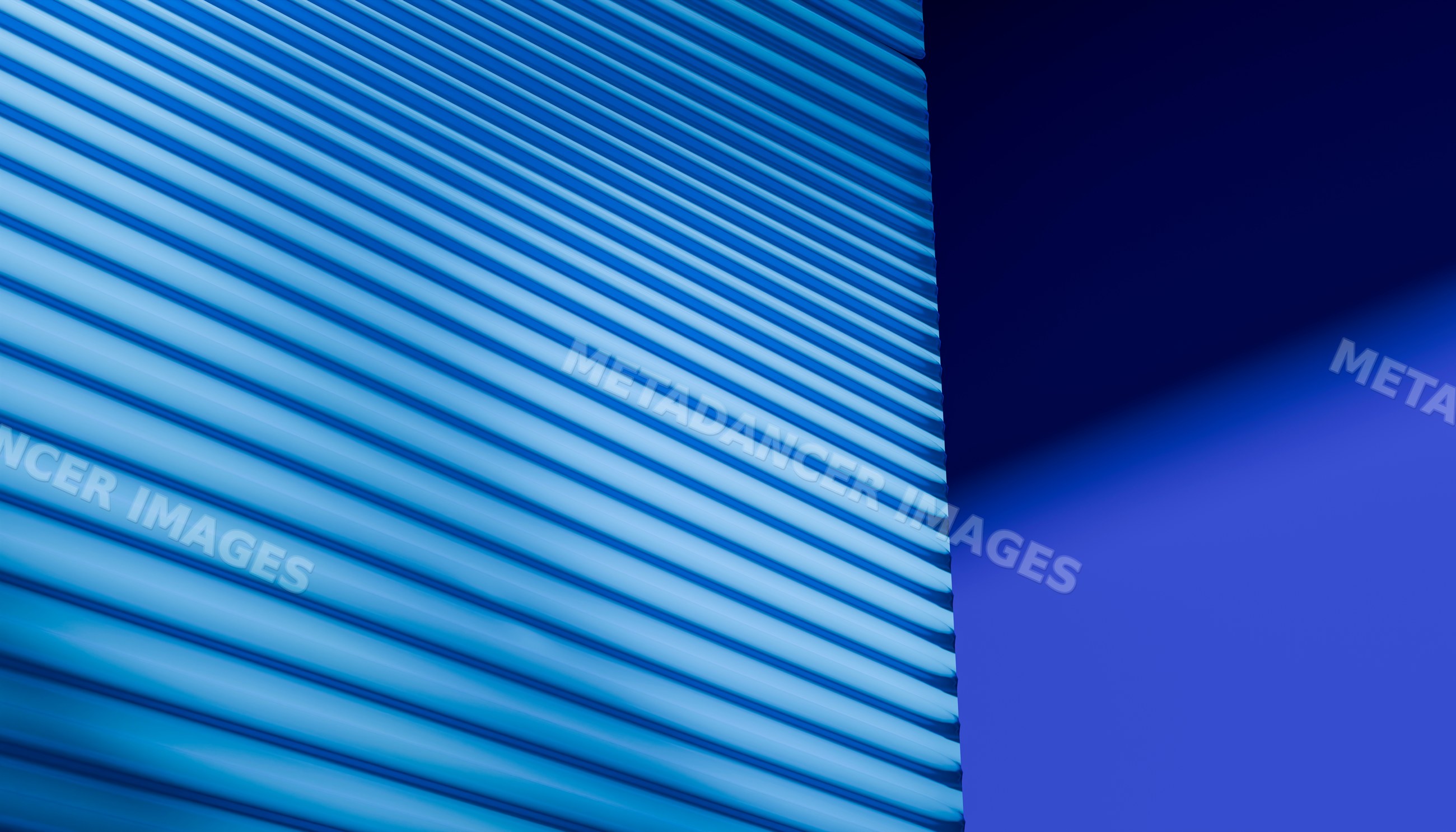 Close-up of blue exterior window shutters casting shadows on a blue