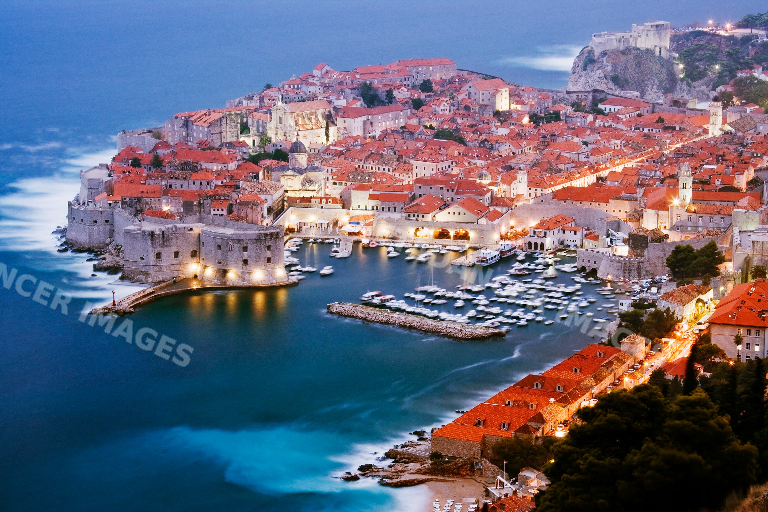 Old city of dubrovnik with medieval walls and harbor