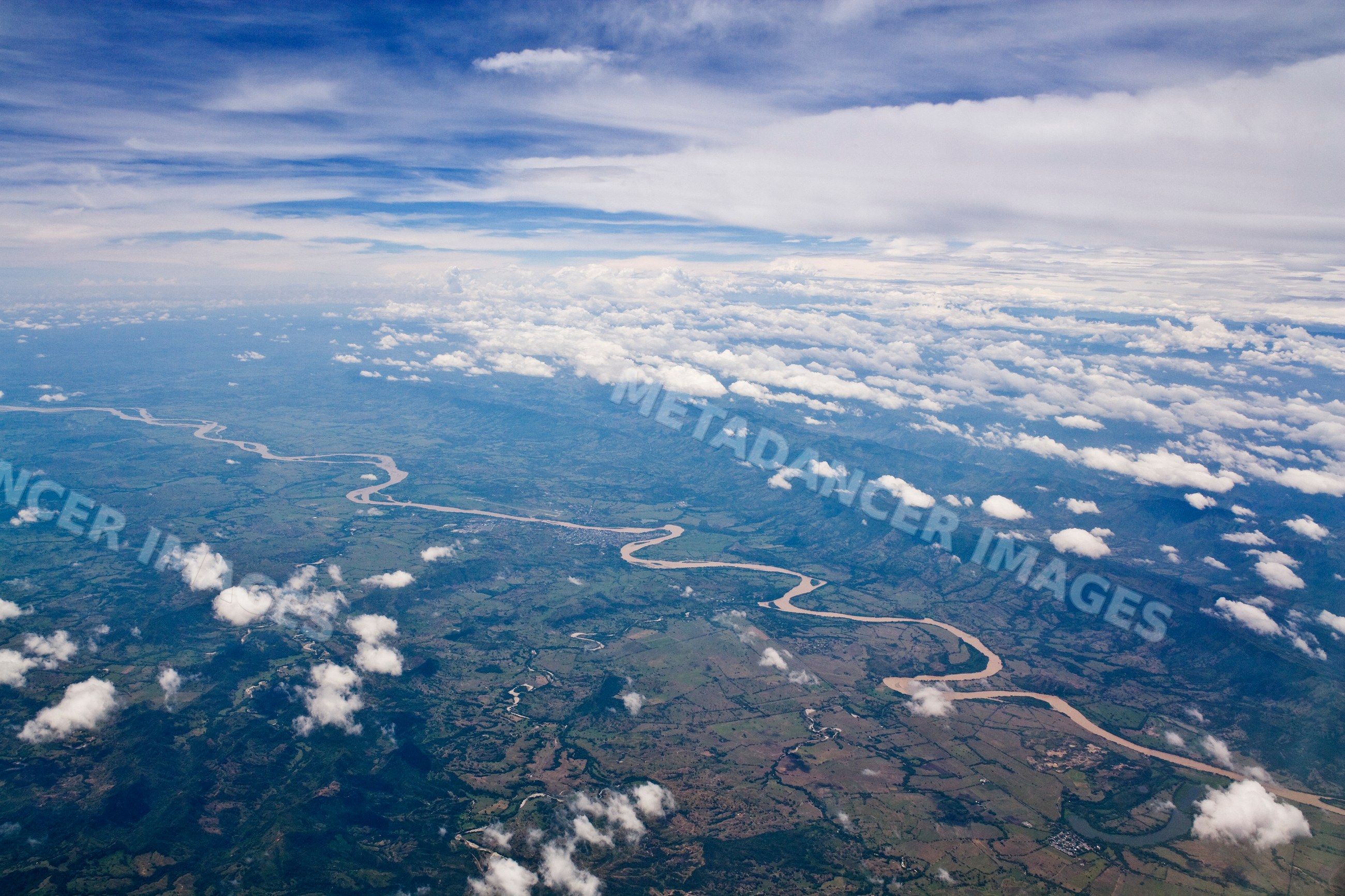 Aerial view of river winding through landscape near bogota colombia