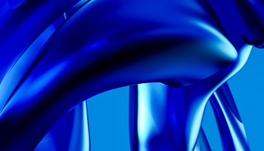Blue abstract sculpture with smooth reflective curves