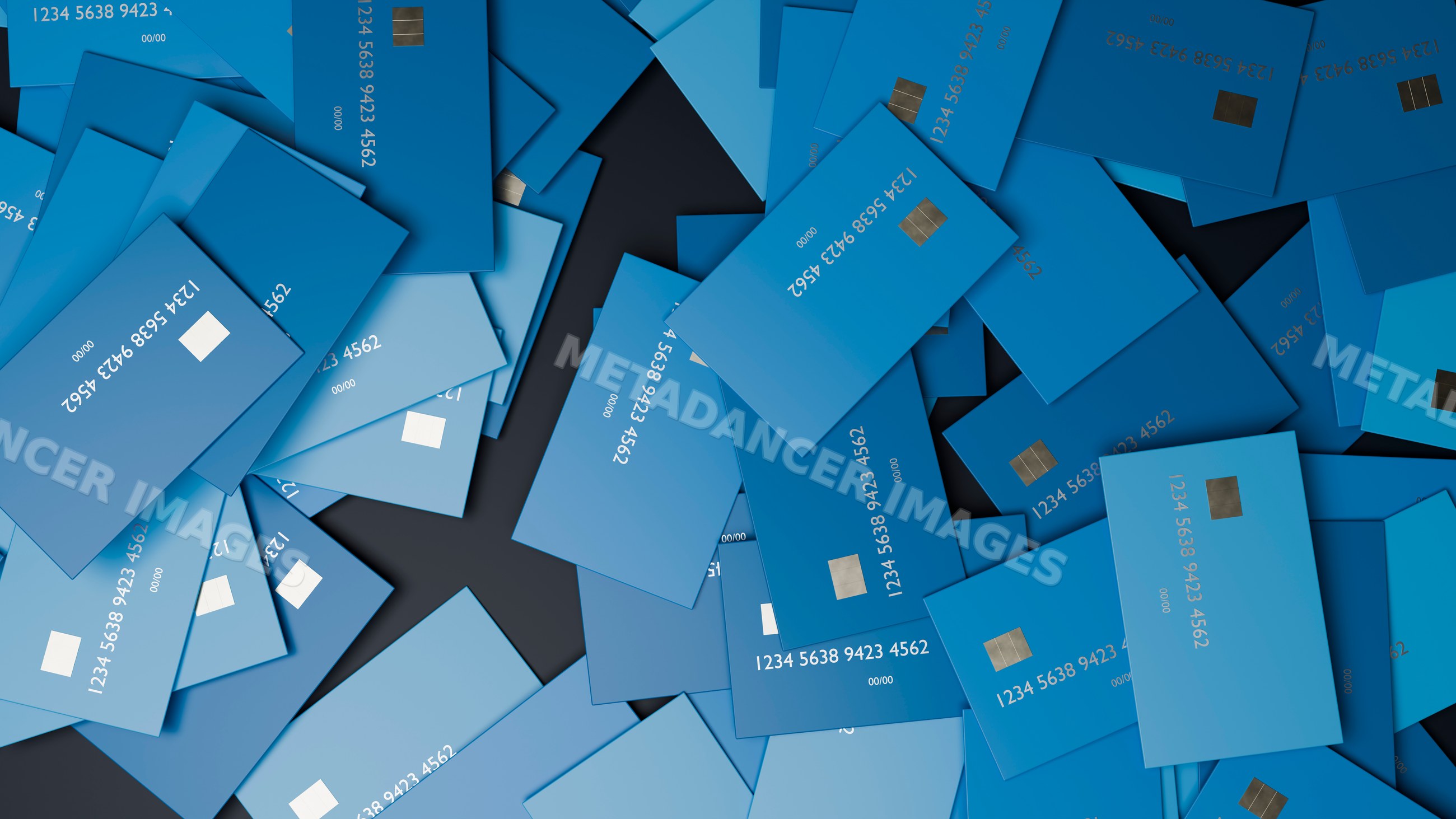 Pile of blue credit cards with chip technology and visible card