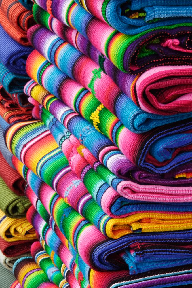 Colorful woven fabrics rolled guatemala