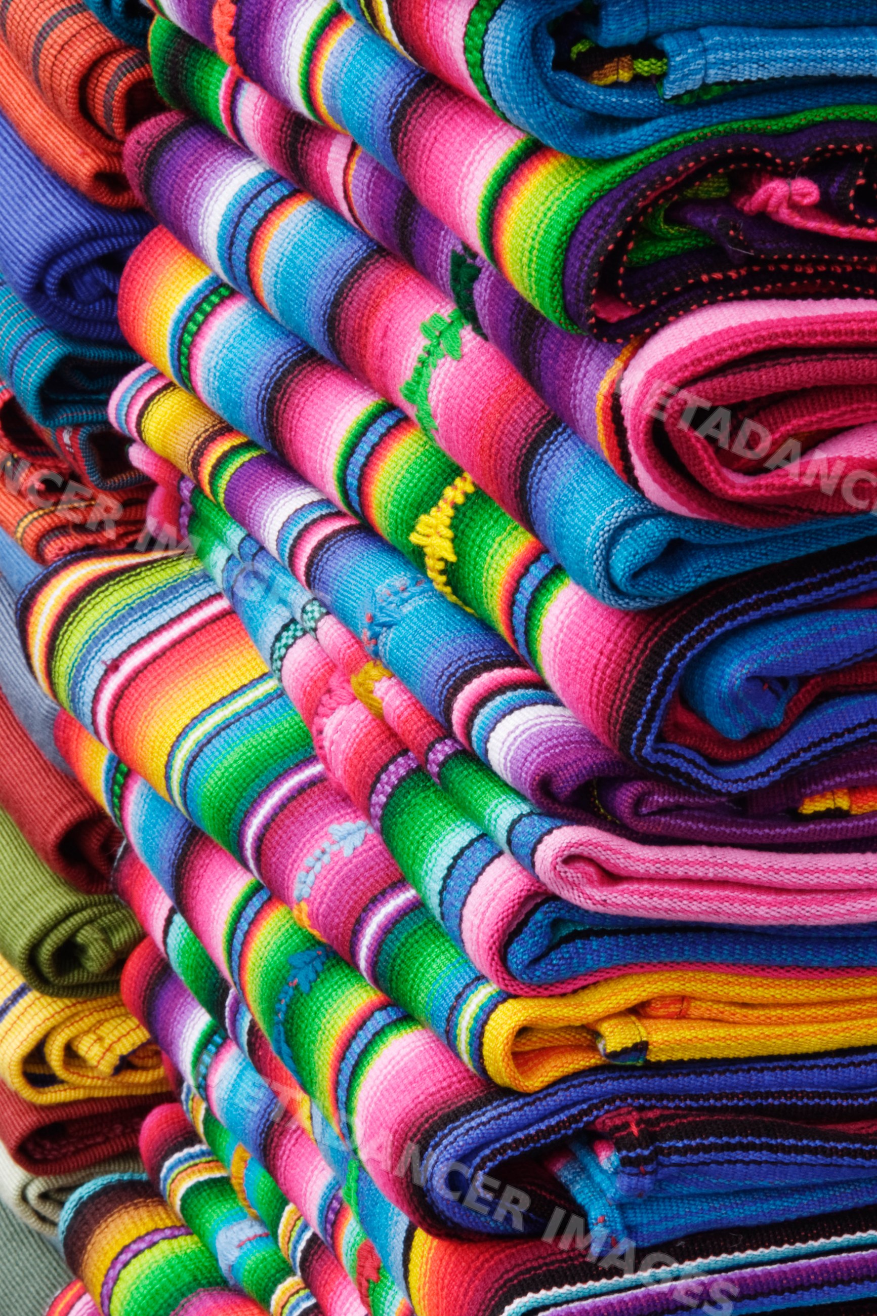 Colorful woven fabrics rolled guatemala