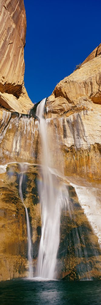 Waterfall flowing over rocky cliffs, utah