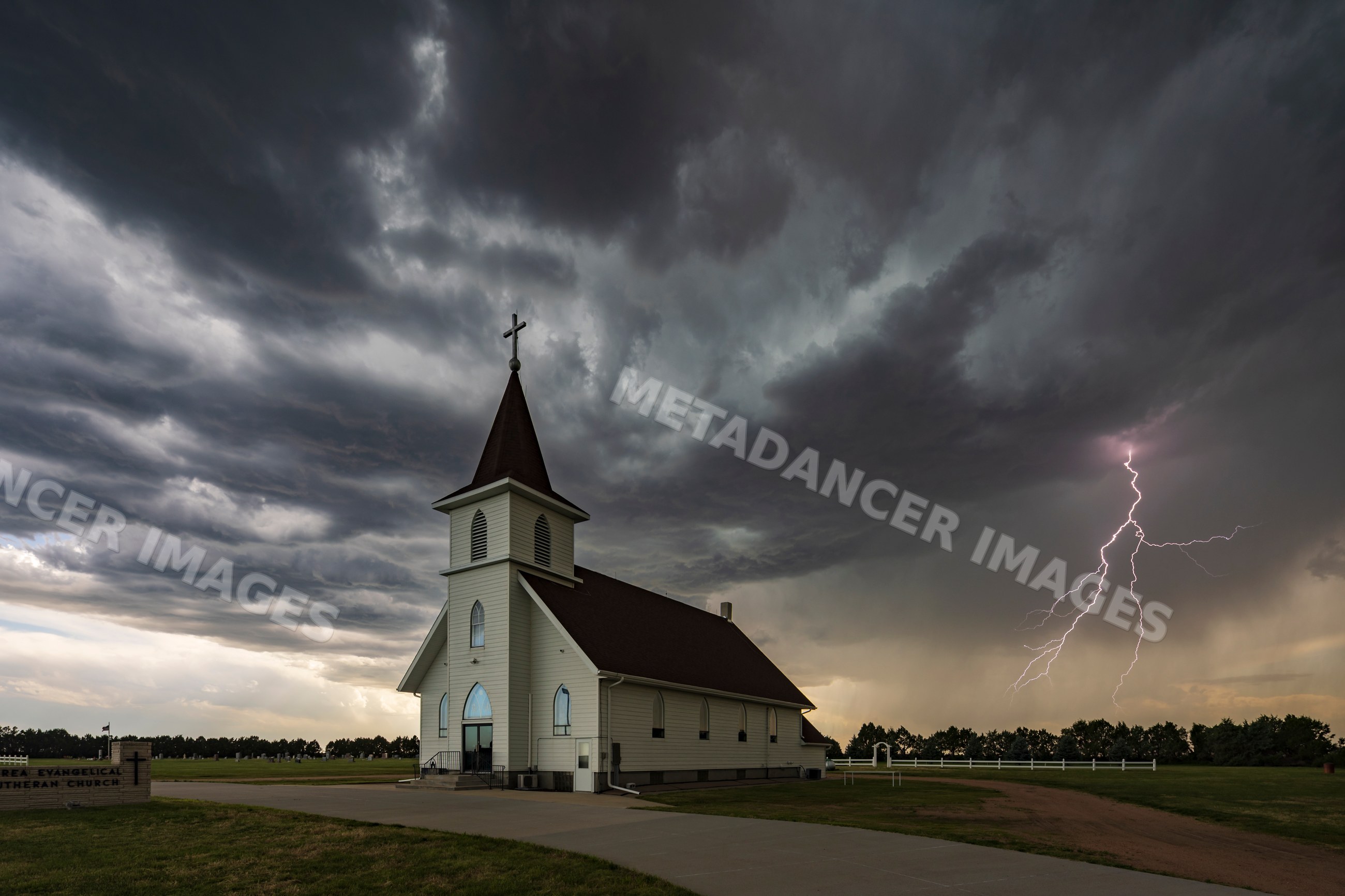 Lightning strikes near Berea Lutheran Church during storm in rural