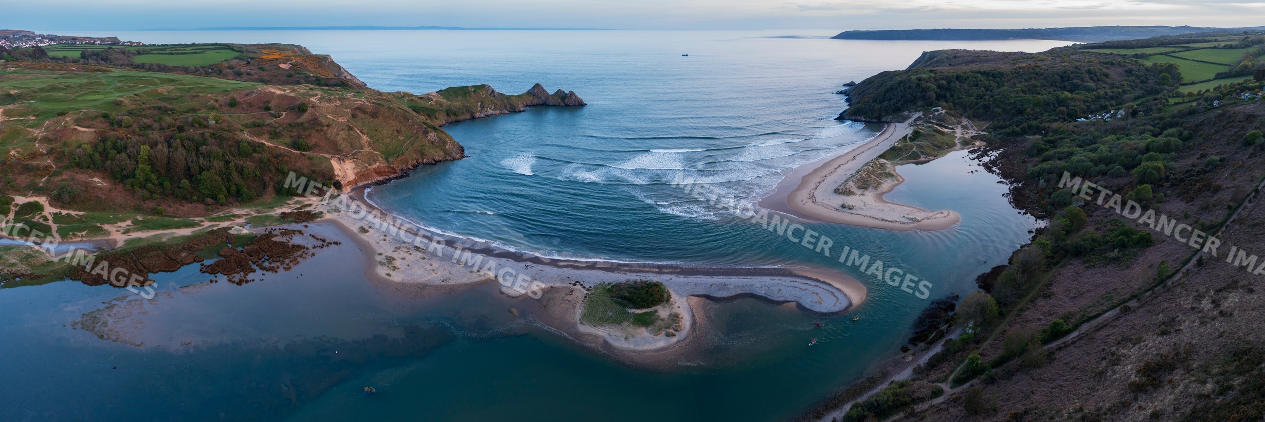 Three Cliffs Bay aerial view of beach and cliffs in gower peninsula