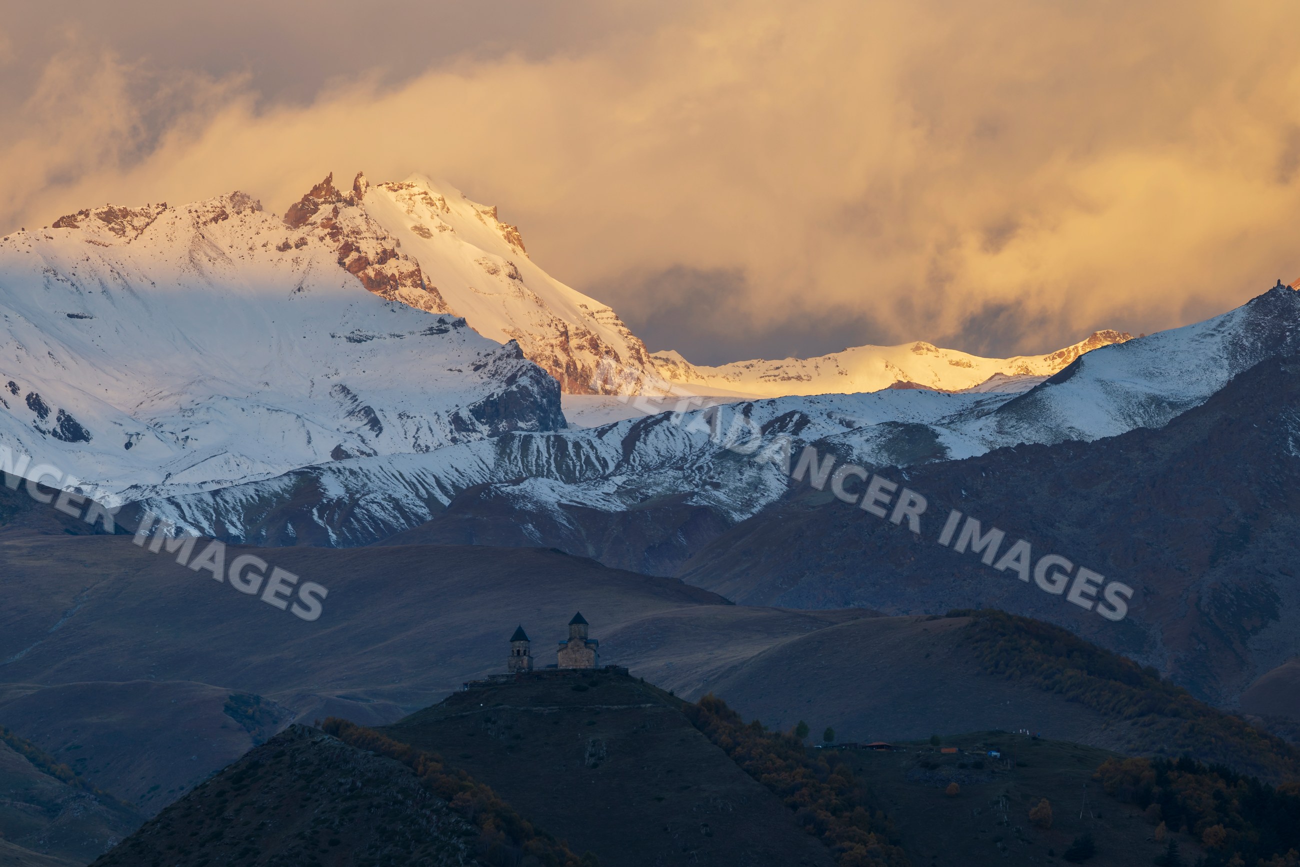 Gergeti trinity church at Dawn in stepantsminda, Georgia