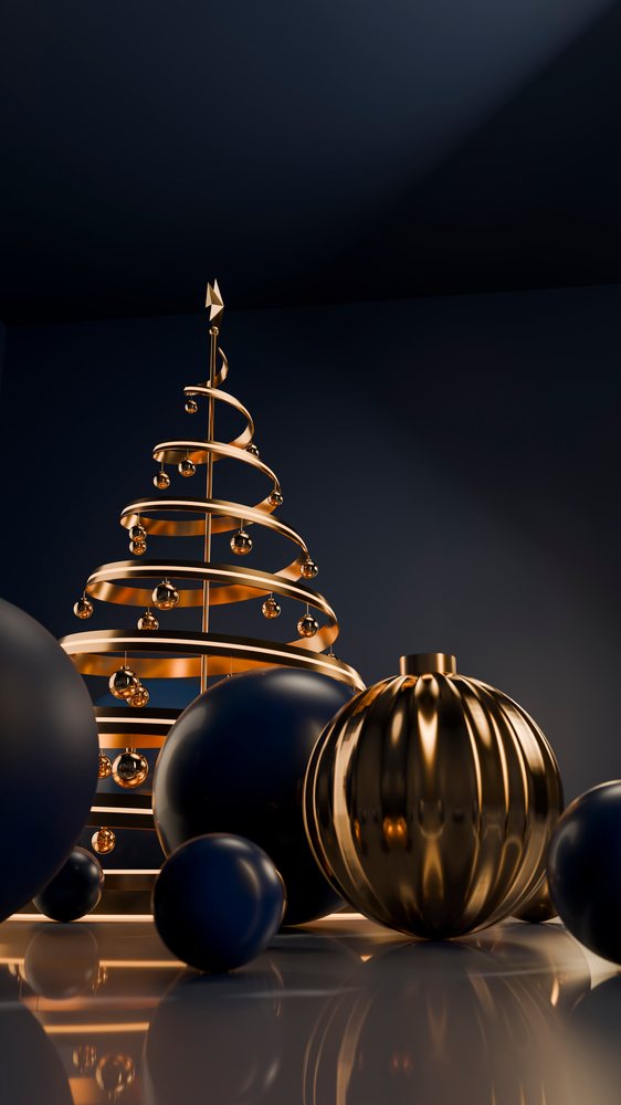 Metallic spiral christmas tree with black baubles on reflective