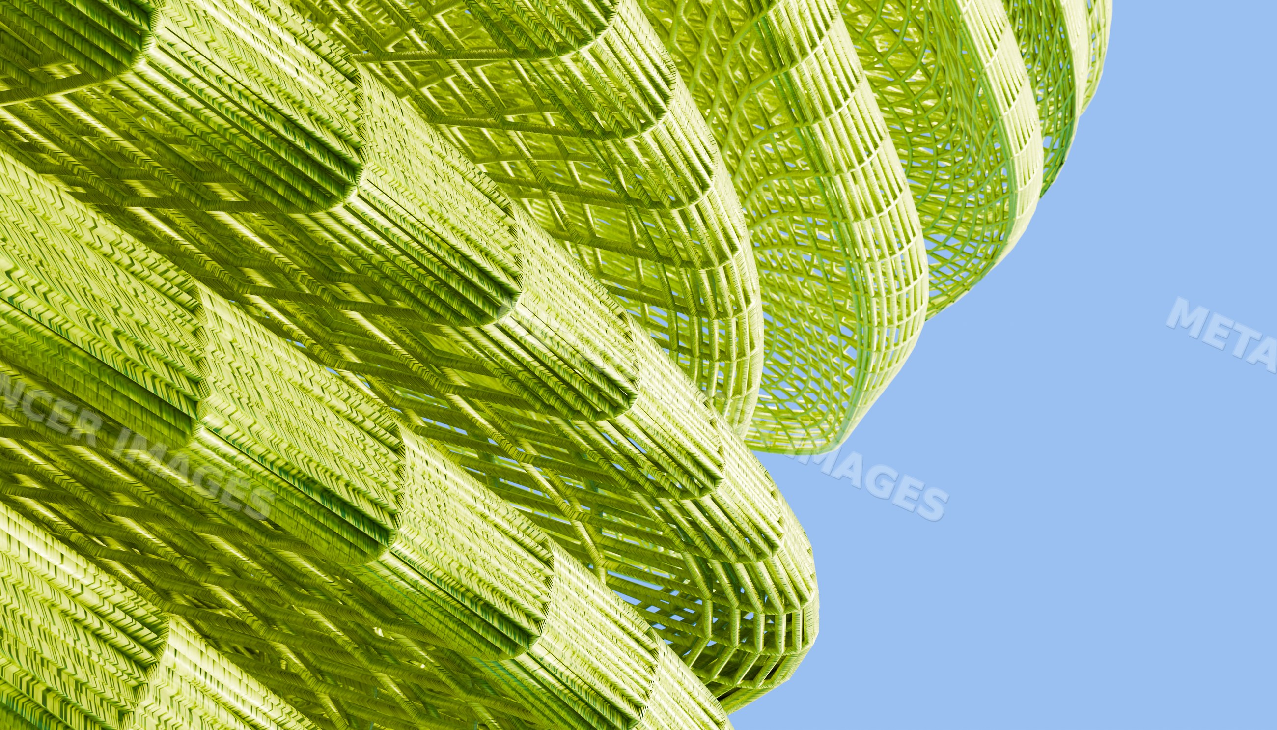 Close-up view of a green abstract woven sculpture outdoors