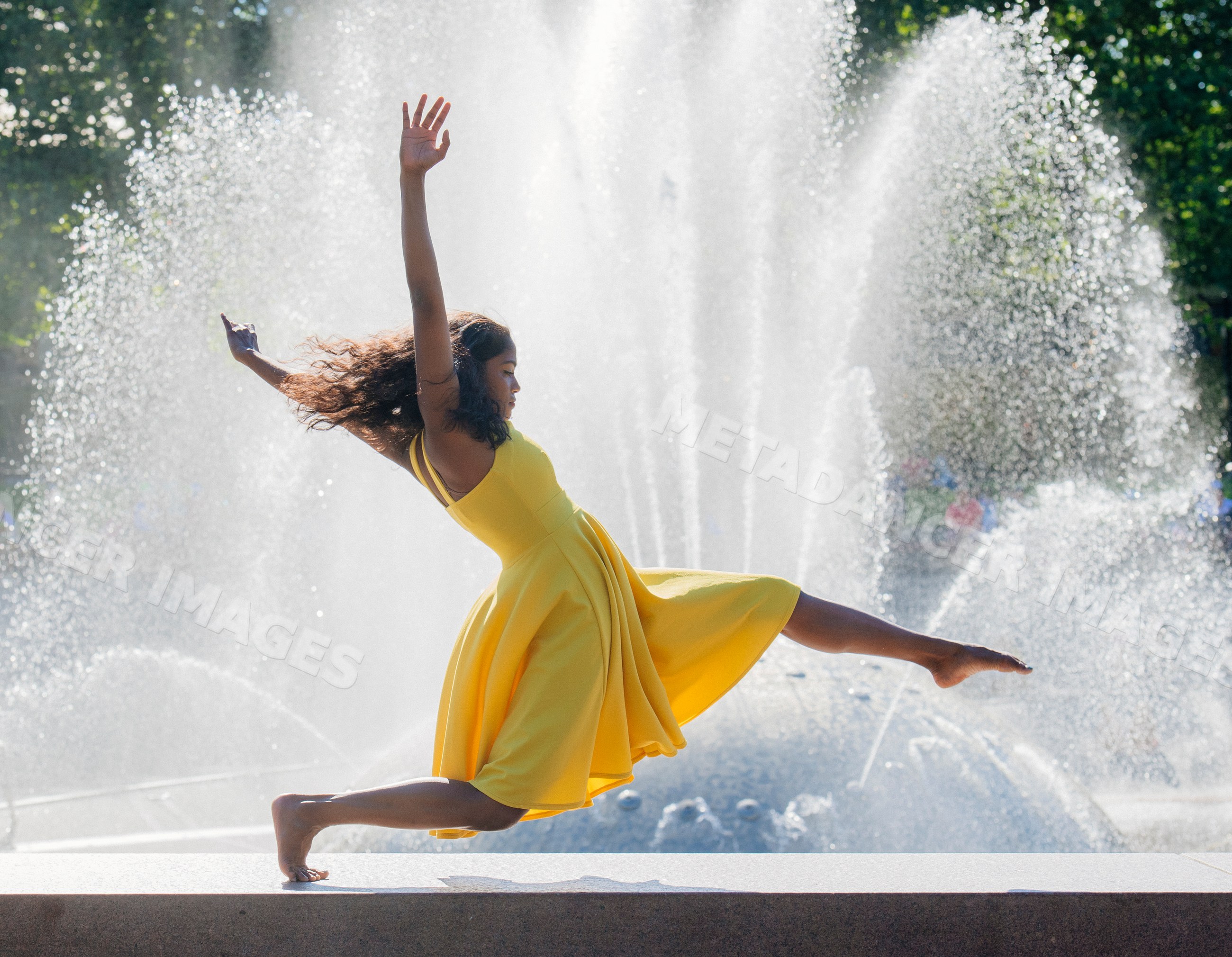 South Asian woman leaping gracefully