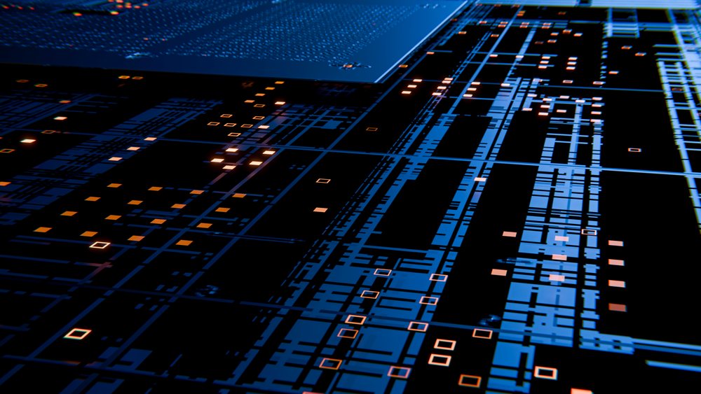 Close-up of blue printed circuit board with illuminated microchips