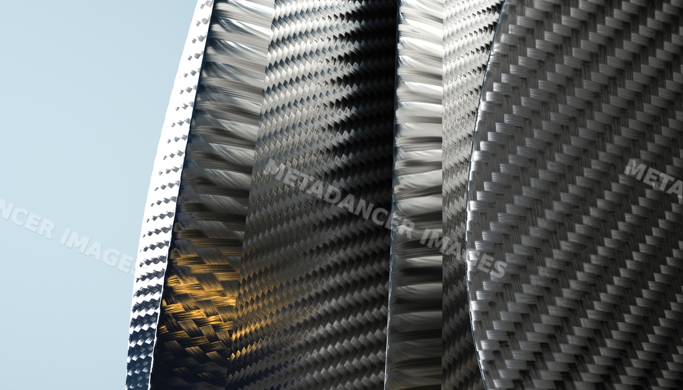 Close-up of curved carbon fiber sheets with reflective weave texture