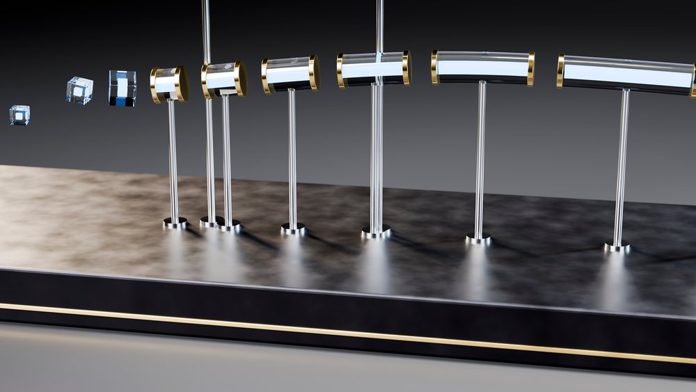 Newton's cradle demonstrating kinetic energy and momentum transfer