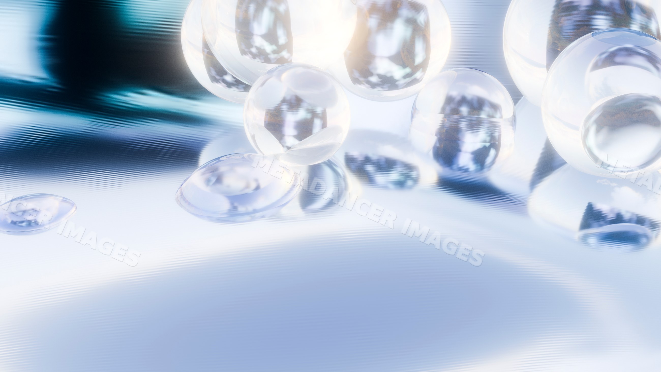Transparent glass spheres reflecting light on smooth surface