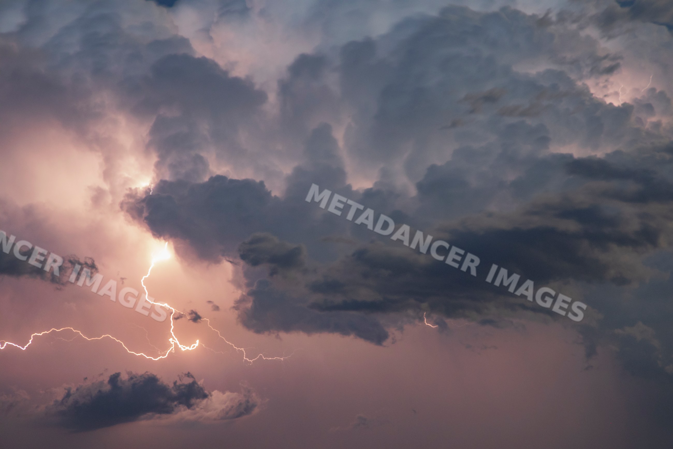 Lightning strike in turbulent Supercell storm clouds over nara visa