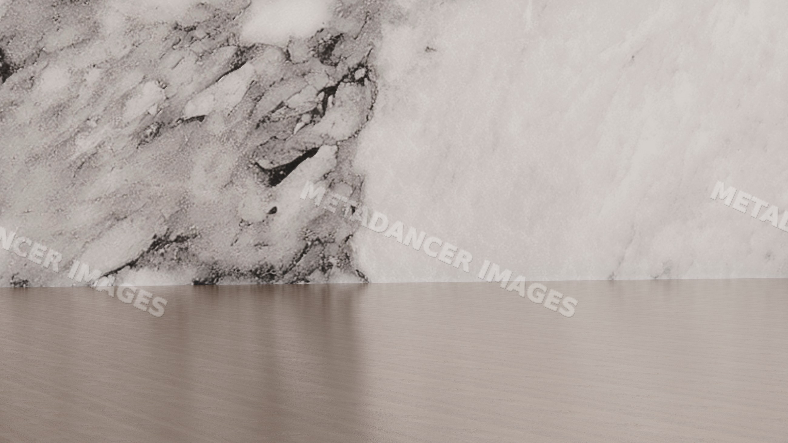Interior space with marble-textured wall and light wood flooring