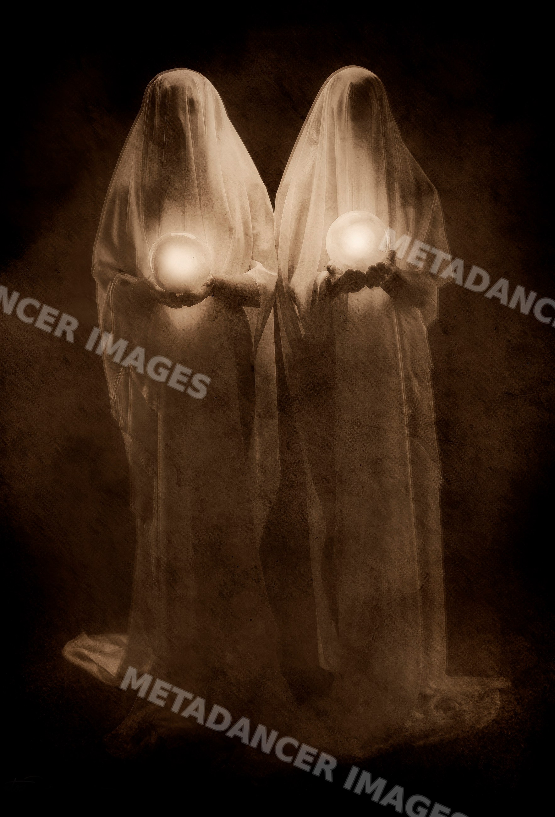 Two ghost figures holding glowing orbs against dark background