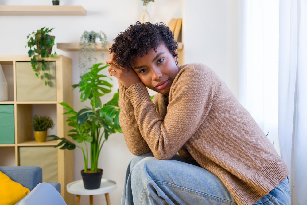 Young African American woman sitting relaxed