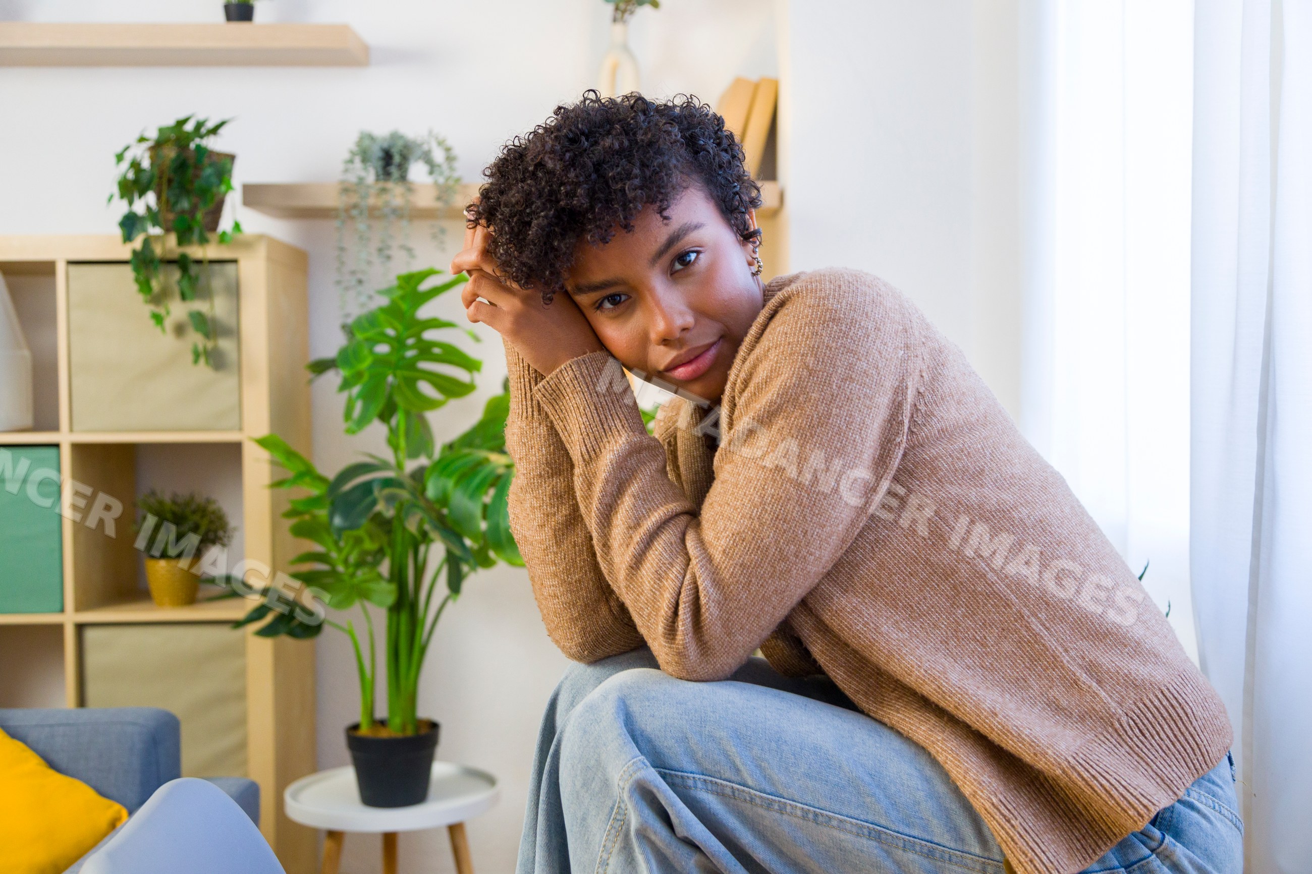 Young African American woman sitting relaxed