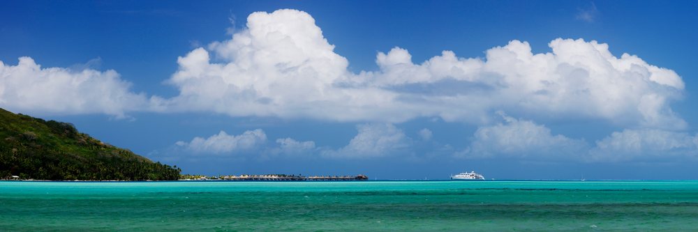 View of bora nui resort on motu toopua island with turquoise tropical