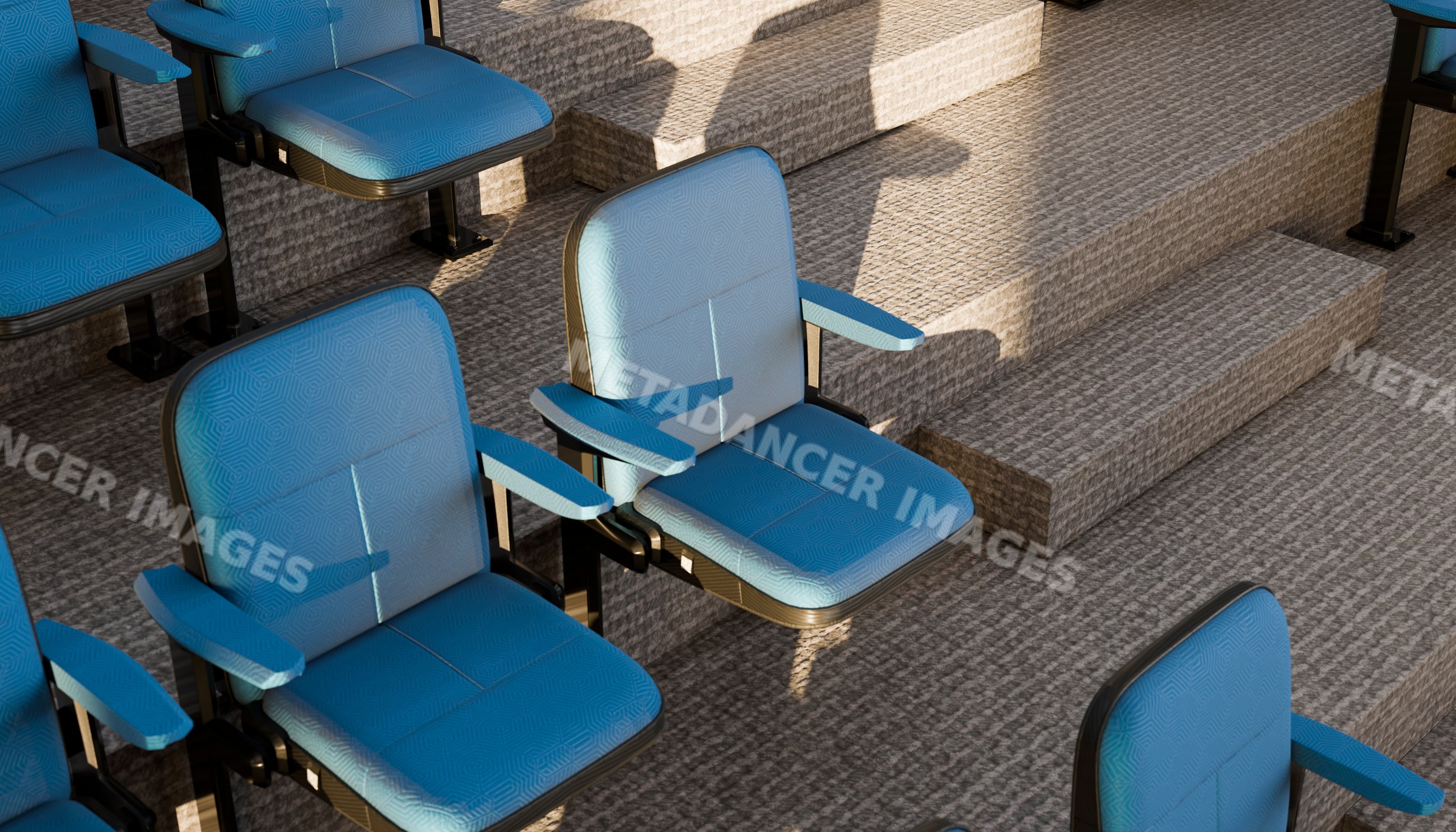 Blue cushioned theatre seats on tiered carpeted steps