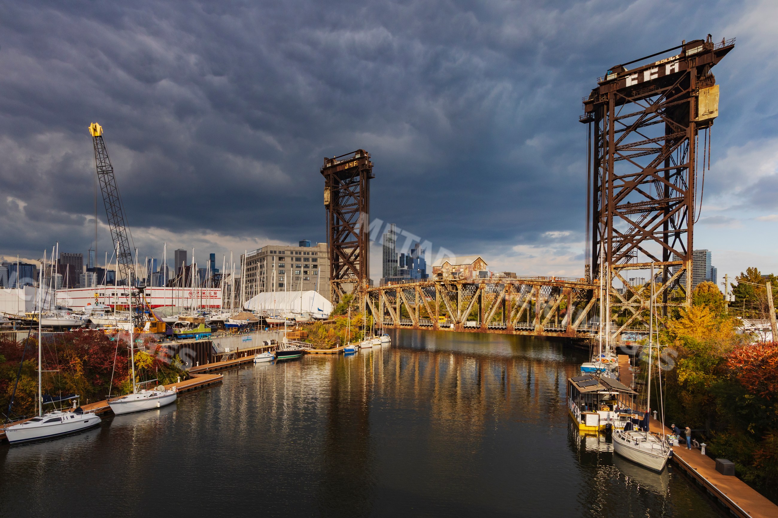 Canal Street Lift Bridge over river with boats in a street