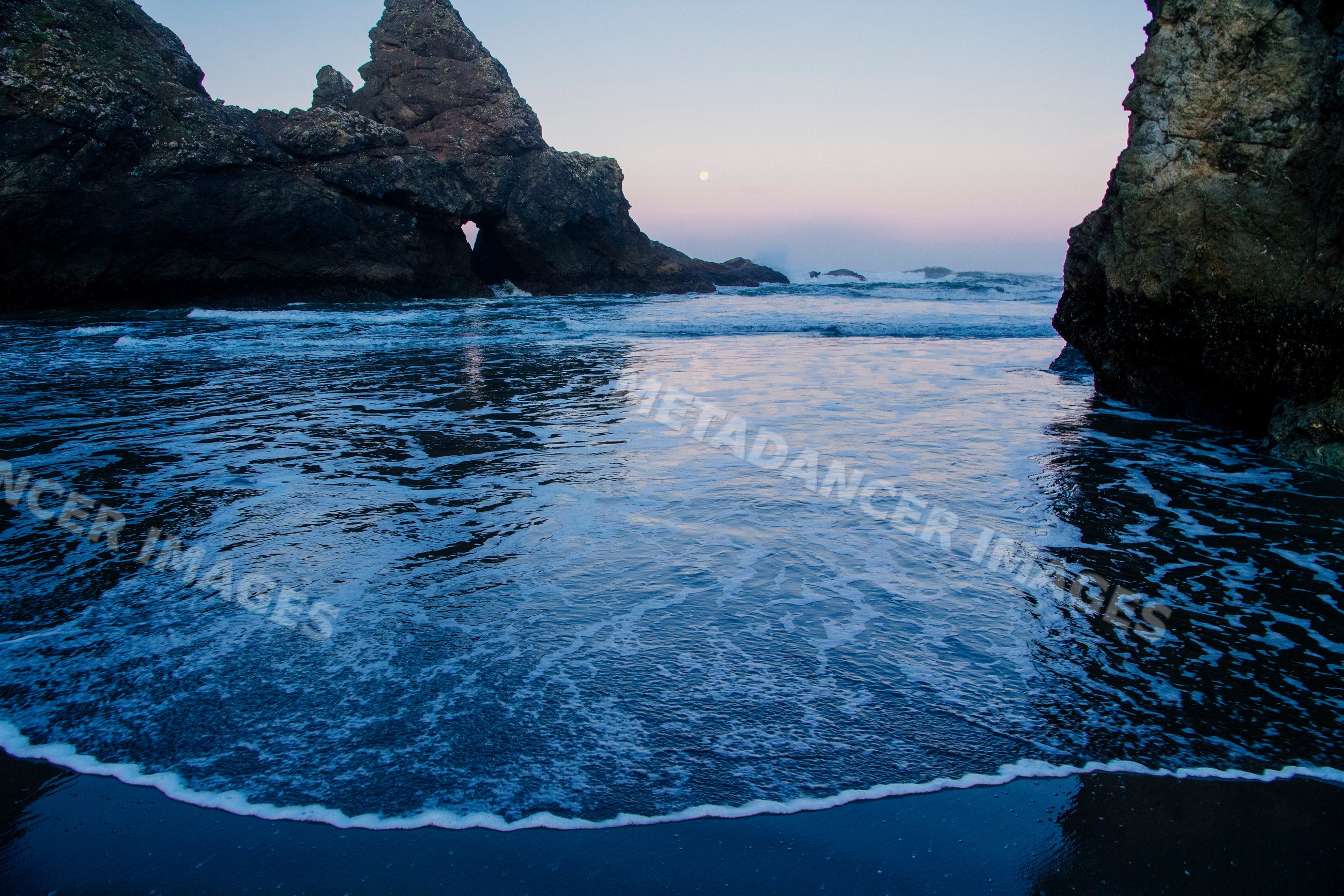 Waves washing onto rocky beach at meyers creek Oregon