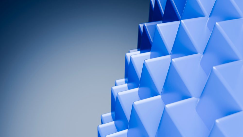 Blue abstract geometric pattern with triangular 3d shapes