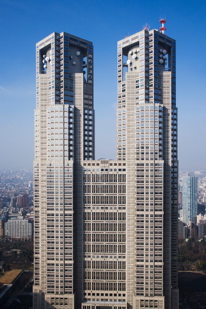 Metropolitan government building twin towers cityscape