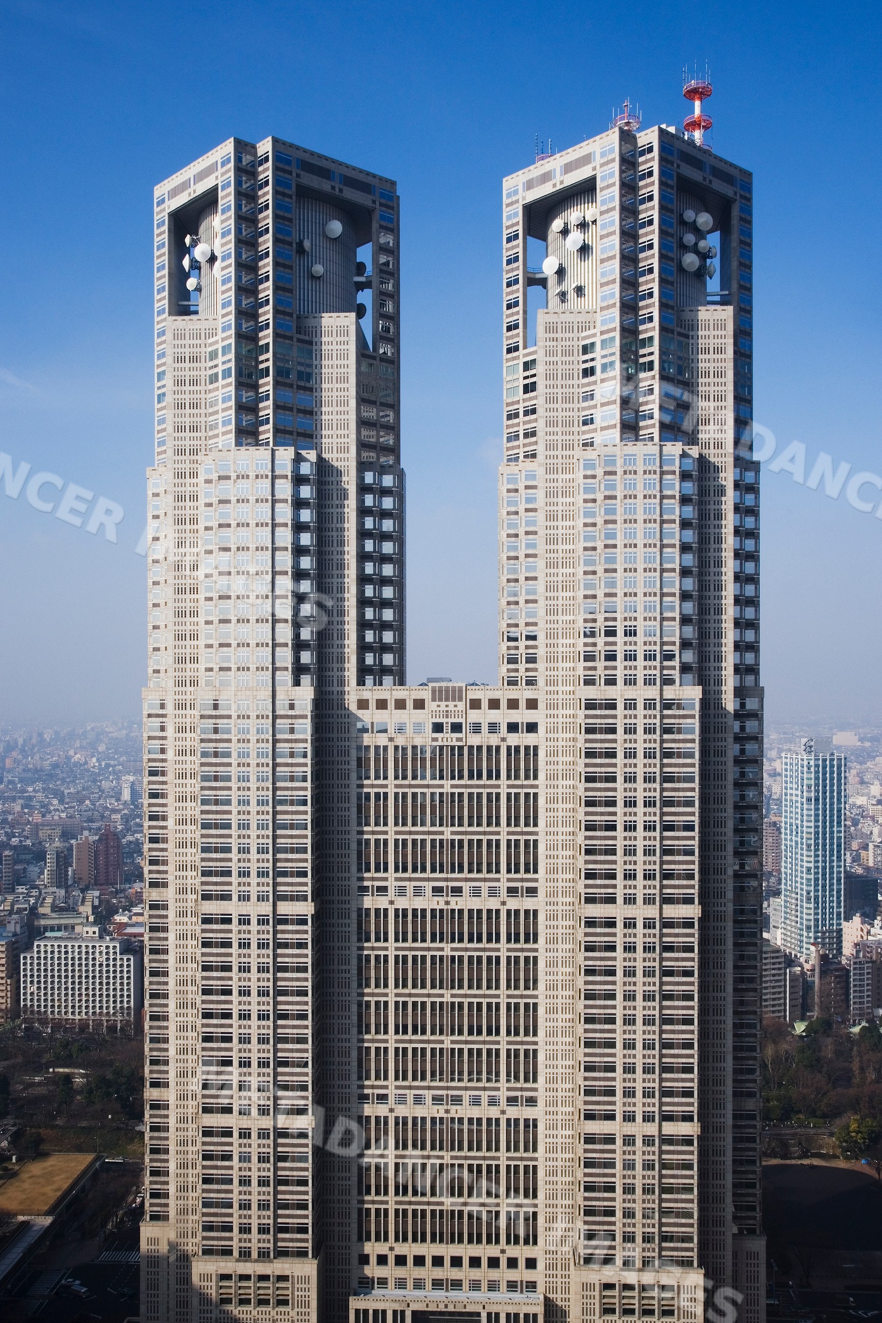 Metropolitan government building twin towers cityscape