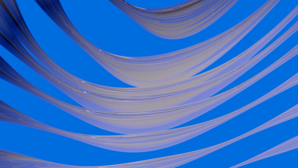 Abstract digital illustration of translucent flowing blue curves