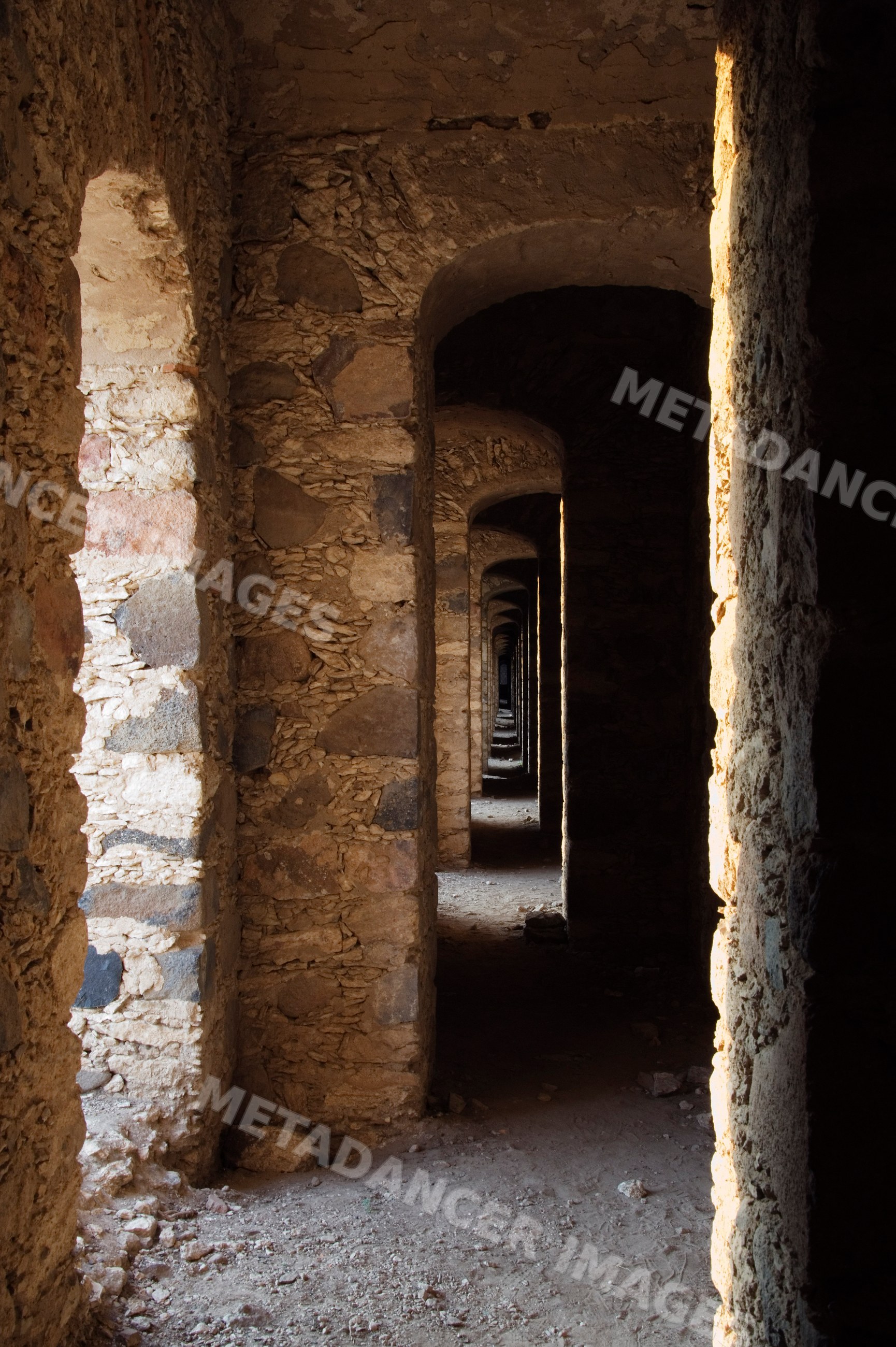 Old ovens corridor with stone arches, mexico
