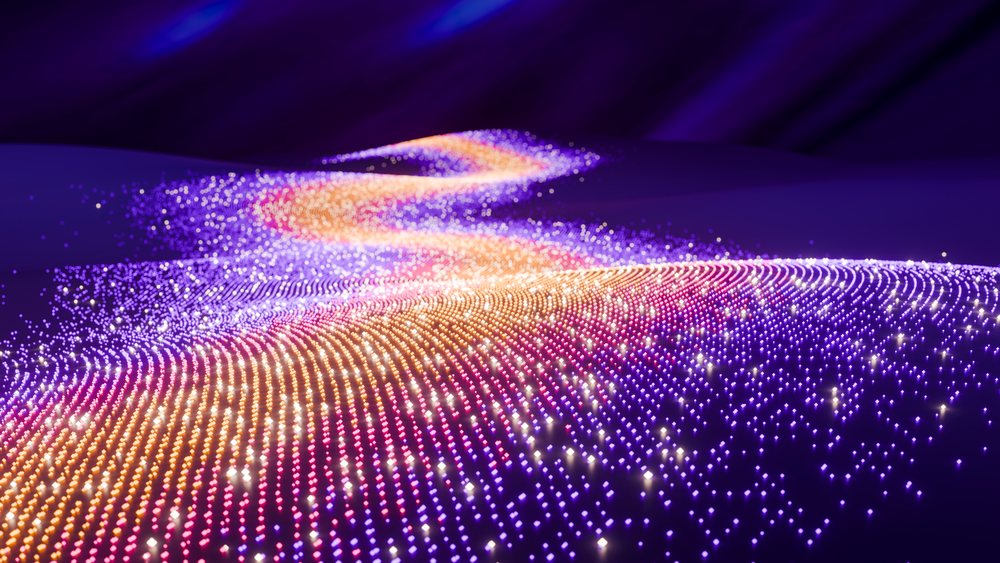 Curved glowing digital particle waves in colorful abstract pattern