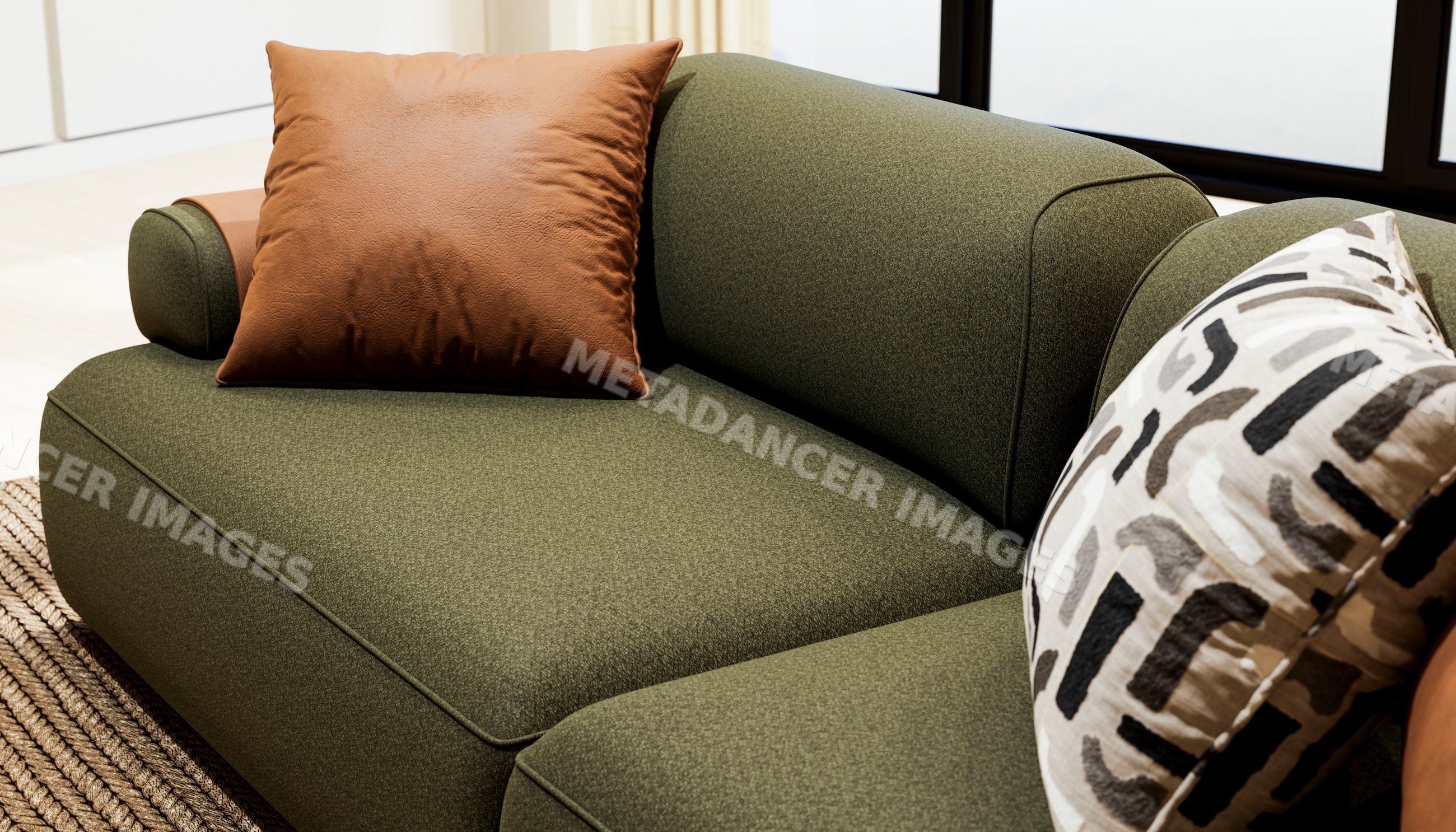 Green upholstered sofa with brown leather and patterned cushions