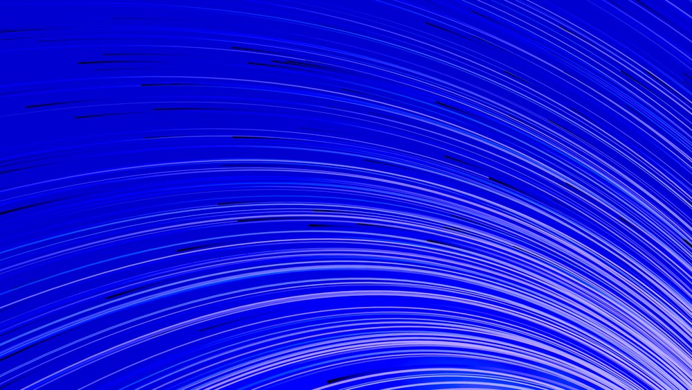 Curved blue light trails creating an abstract pattern
