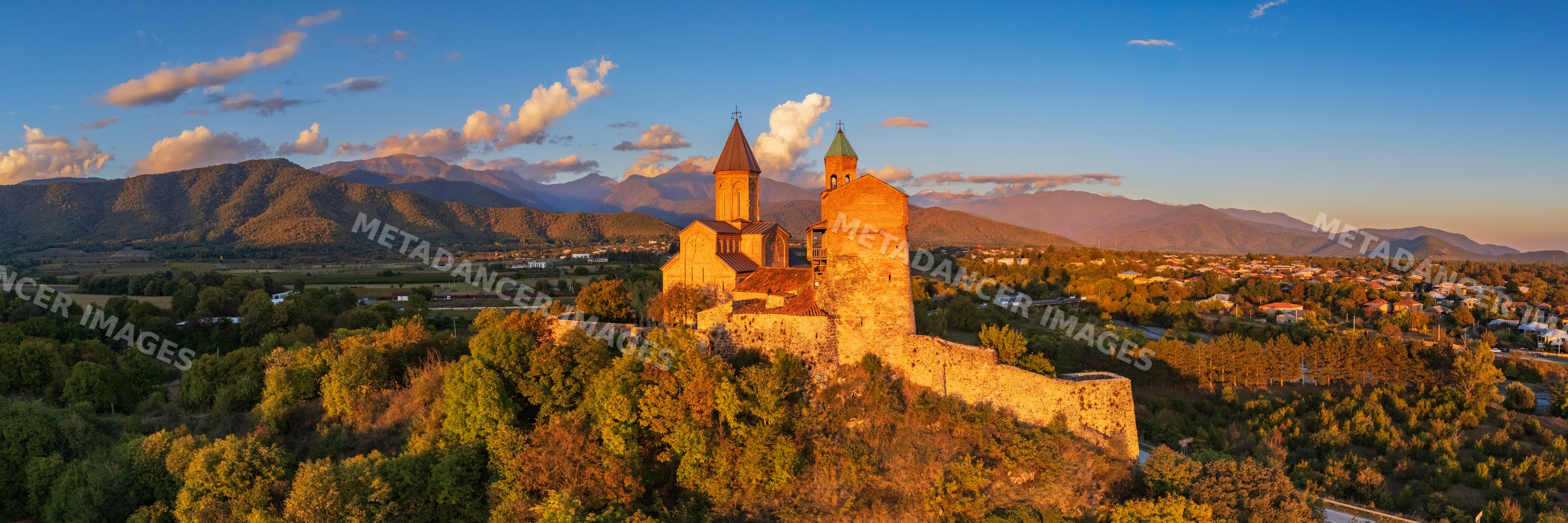 Gremi monastery at Sunset overlooking georgian landscape