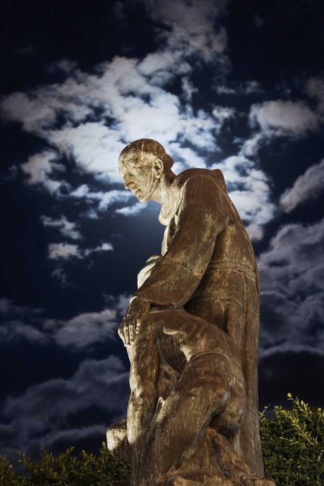 Bronze statue of san miguel at night, mexico