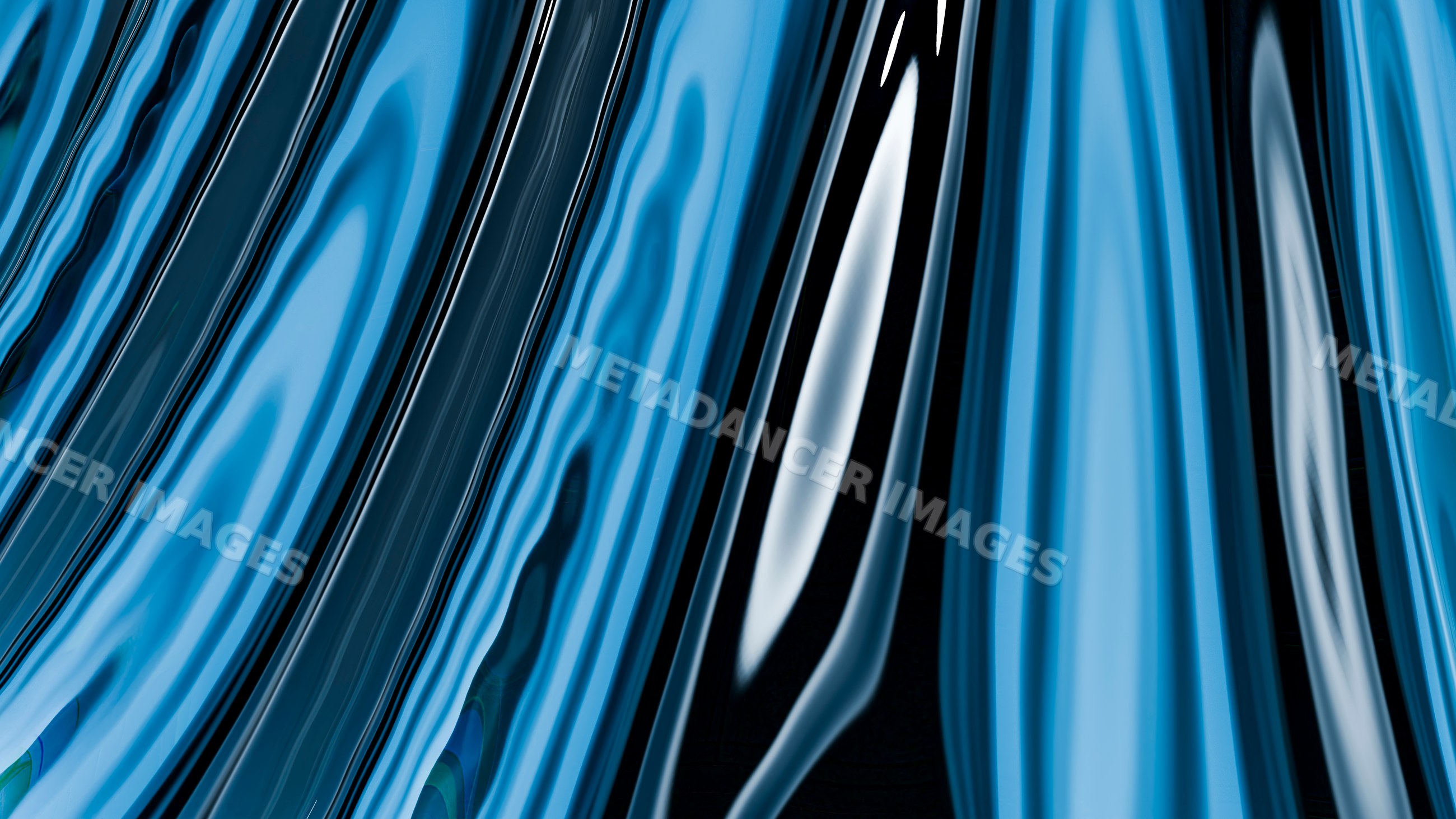 Abstract digital art of blue fluid wavy lines with glossy reflections